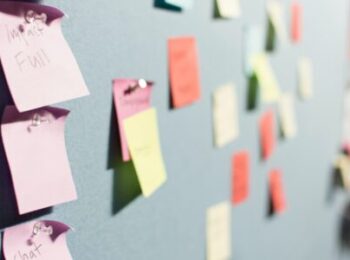 Wall full of colourful sticky notes